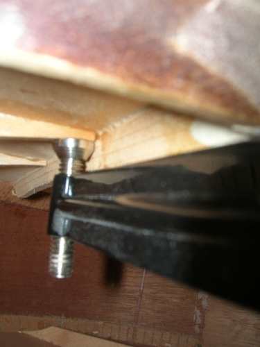 Inside view of re-gluing a top brace on 1959 Gibson LG-2