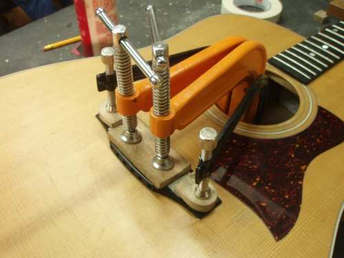 Gluing on the bridge of the Taylor 420