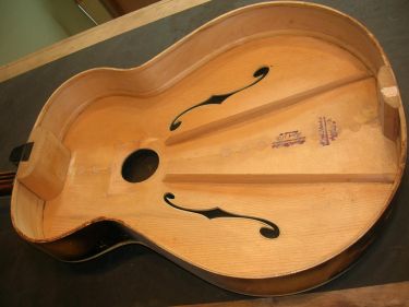 Here is the inside of the top with spruce added to recreate the soundhole.